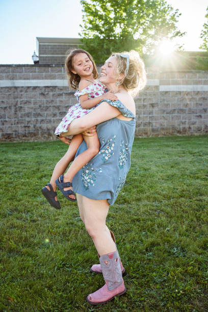 istock Loving auntie spending time with her niece outside 2179115918