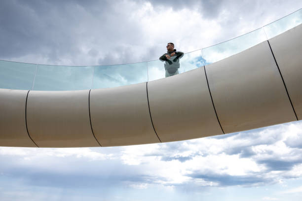 people on glass walk at tianmen mountain in zhangjiajie