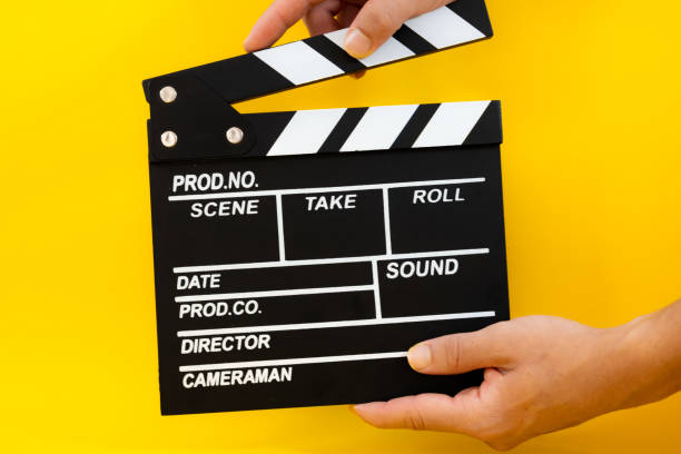 istock male hand closing film clapperboard 2179155388
