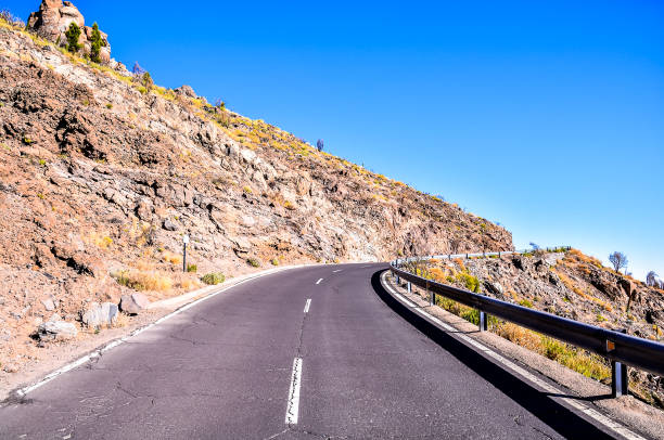 istock A road with a hill in the background 2179156149