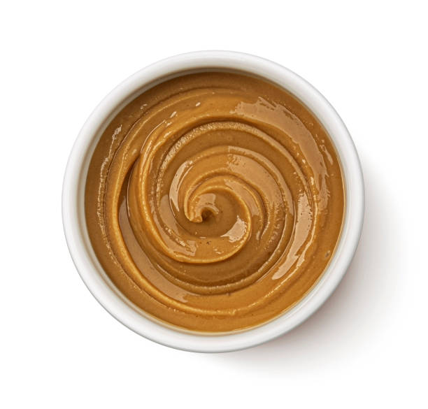 istock Peanut butter isolated on white background, top view 2179157980