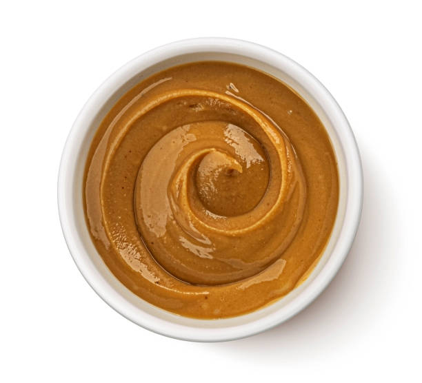 istock Peanut butter isolated on white background, top view 2179158014