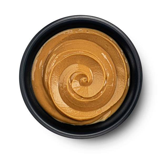 istock Peanut butter isolated on white background, top view 2179158032