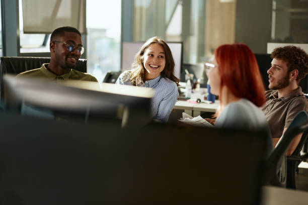 istock Team of young happy programmers talking in the office. 2179158207