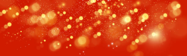 istock Gold sparkles on a red background. Glare sparks flying from above. Vector illustration. 2179159855