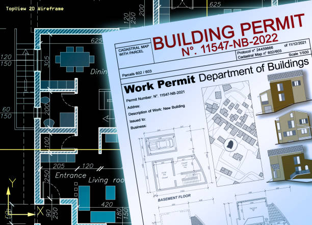 istock BUILDING PERMIT CONCEPT IN BUILDINGS ACTIVITY AND CONSTRUCTION IINDUSTRY with residential building project, imaginary cadastral map and General Urban Plan 2179167092