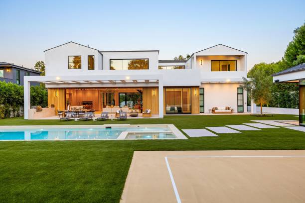 istock Modern luxury home with pool and patio at sunset. 2179169851