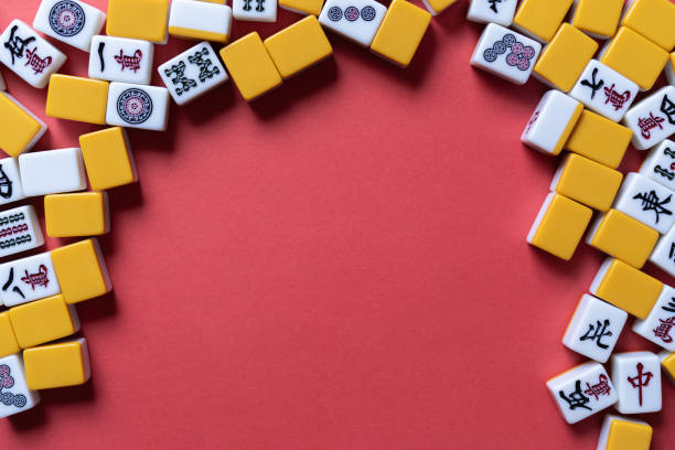 istock Mahjong tiles background on red background 2179169883
