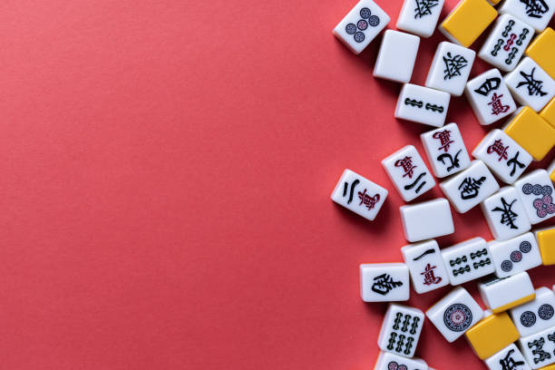 istock Mahjong tiles background on red background 2179169916