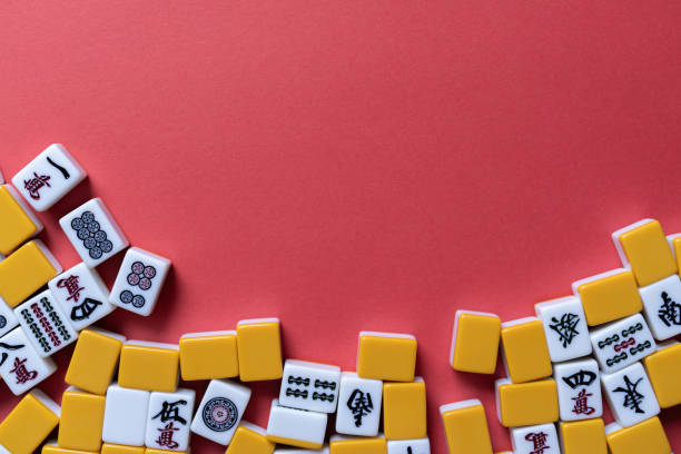 istock Mahjong tiles background on red background 2179169951