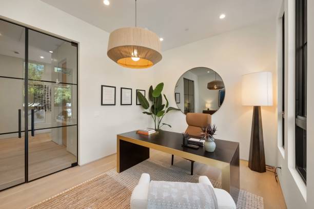 istock Modern home office with sleek furniture and decor. 2179169970