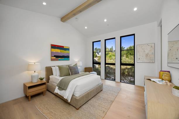 istock Modern bedroom with minimalist decor and large window. 2179169985