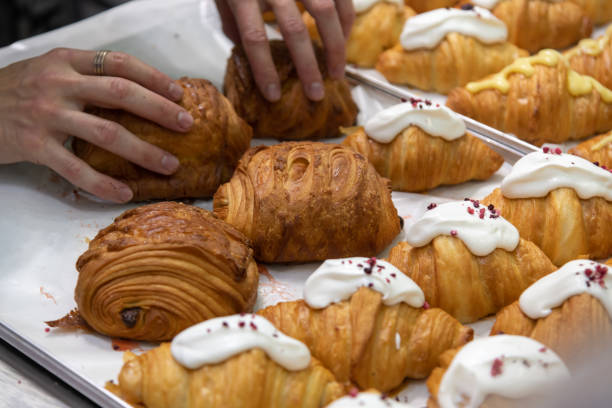 istock Chef and fresh baked croissants 2179170202