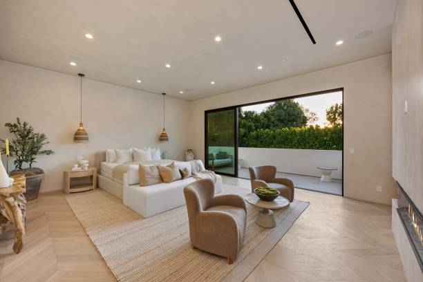 istock Modern living room with neutral tones and greenery view. 2179170320