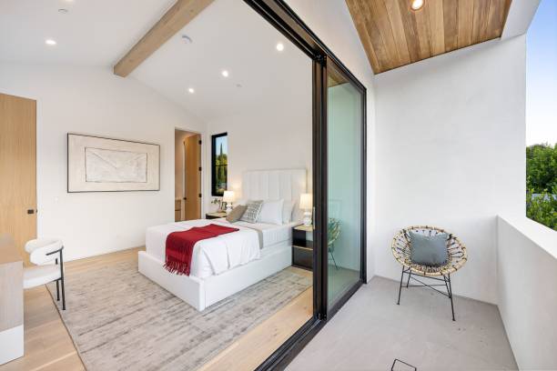 istock Modern bedroom with balcony and chic decor. 2179170337