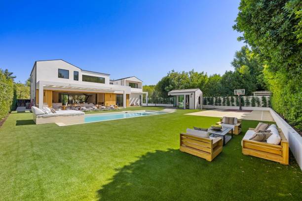 istock Modern luxury home with pool and outdoor seating. 2179170959