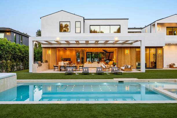 istock Modern luxury home with pool at dusk. 2179171087