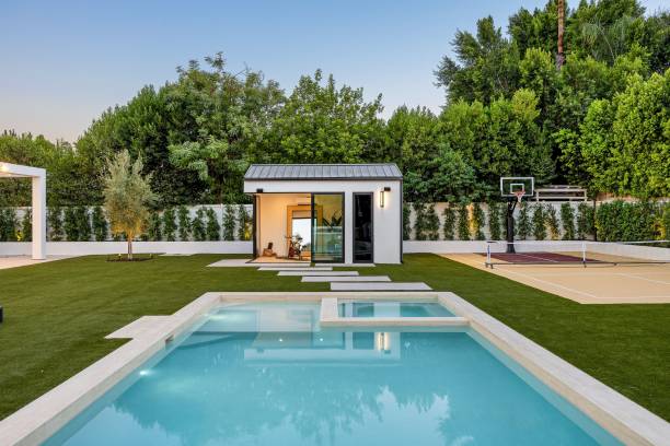 istock Modern backyard with pool and court 2179171251