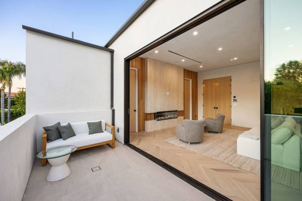 istock Modern indoor-outdoor living space with cozy seating. 2179171337