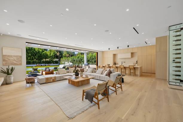 istock Modern open-plan living room with garden view. 2179171378