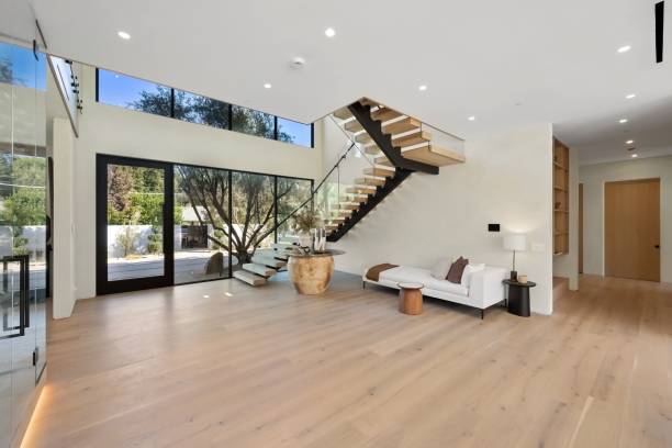istock Modern interior with open staircase and minimalist decor. 2179172222
