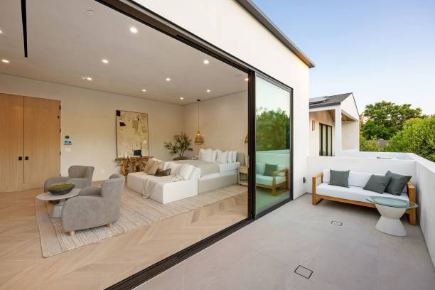 Modern living room with open balcony.