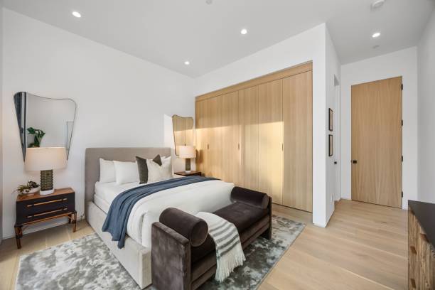 istock Modern bedroom with stylish decor and cozy ambiance. 2179172228