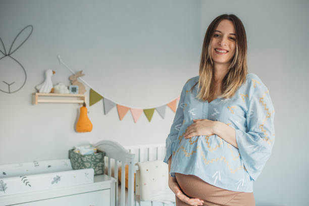 Young woman enjoying in pregnancy