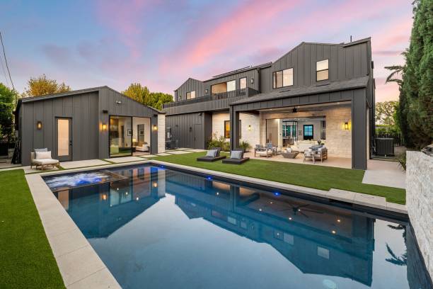 istock Modern luxury home with pool at sunset. 2179172843
