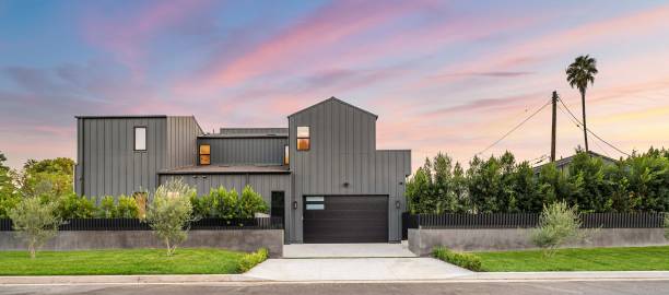 istock Modern gray house with sunset sky. 2179172900