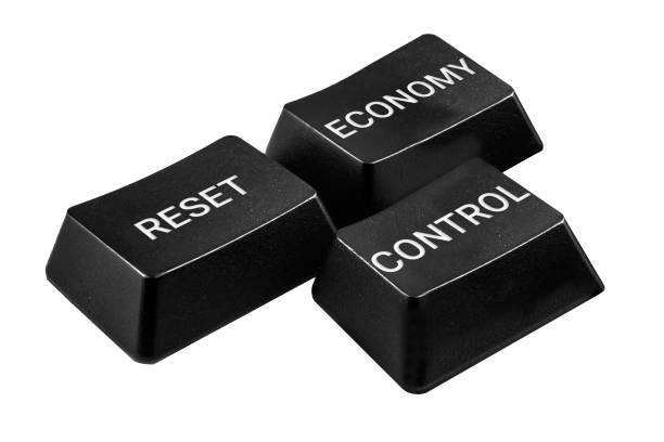 three black keys labeled RESET, ECONOMY, and CONTROL, representing the concept of managing and resetting economic control systems uniquely.