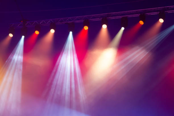 istock Colorful stage spotlights. Lights beam for showing presentation. 2179178851