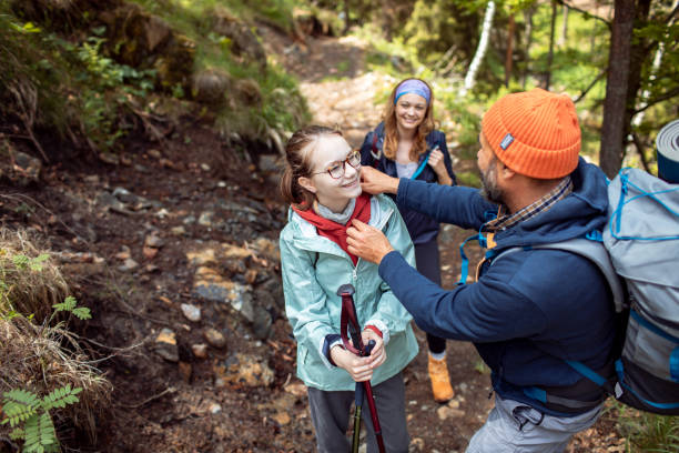 istock Young family hiking in a forest 2179183484