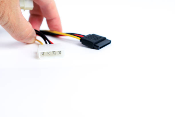 istock Hand holding IDE to Sata connector adapter 2179184558
