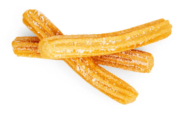 istock Flying Churros isolated on white background. Fried churros with sugar  - Traditional Spanish dessert. Top view. Flat lay 2179205847