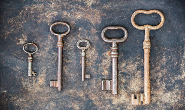 istock Vintage keys on rusty background, escape room game 2179212848
