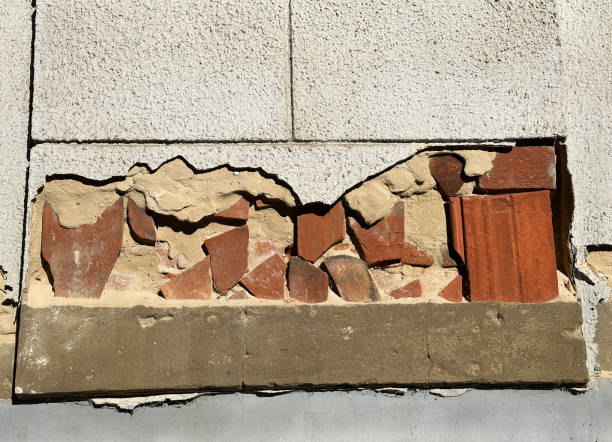 istock Broken brick wall of an old building 2179215608