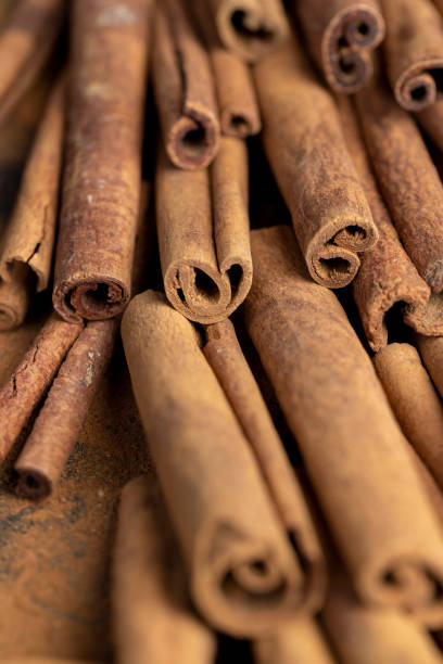 istock whole spice cinnamon and powdered cinnamon on the table 2179219883