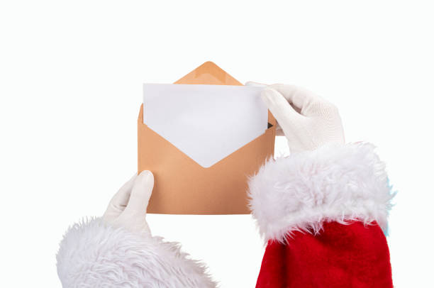 istock Santa Claus opening christmas card 2179220044