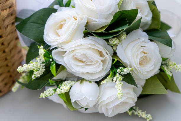 istock A bridal bouquet featuring artificial white roses. 2179224860