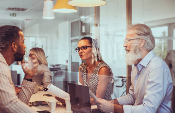 istock Diverse Business Executives Engaged in Strategy Session 2179226701