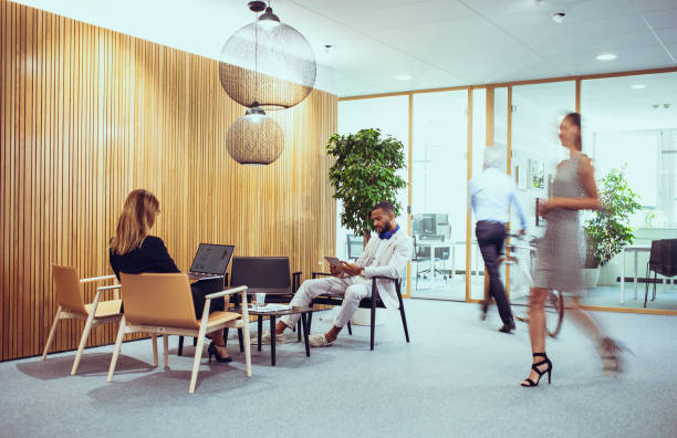 istock Diverse Executives Engaged in Work at Modern Office Lobby 2179227233