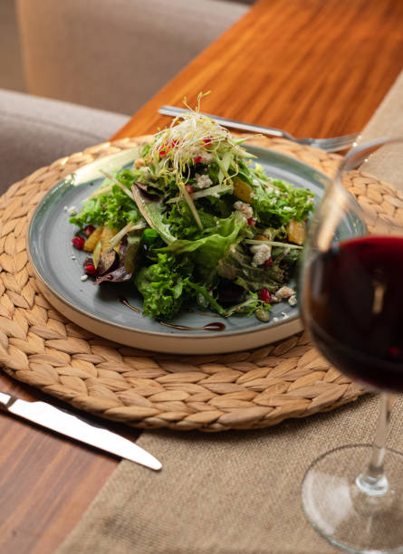 A beautifully presented plate of fresh food served at a restaurant, showcasing vibrant ingredients and artistic culinary skills.