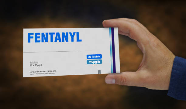 istock Fentanyl opioid painkiller tablets pack in hand 3d illustration 2179229801