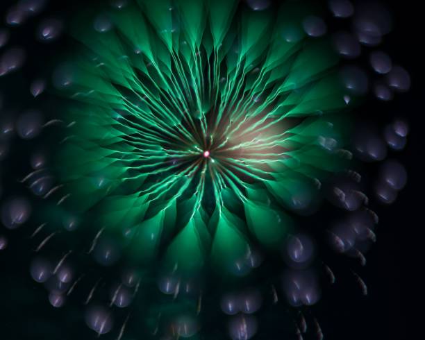 istock Vibrant green firework display captured in the night sky, showcasing its colors and patterns. 2179237042