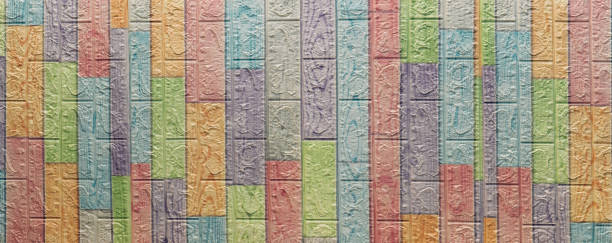 Colorful brick wall painted. multi-colored masonry. rainbow background