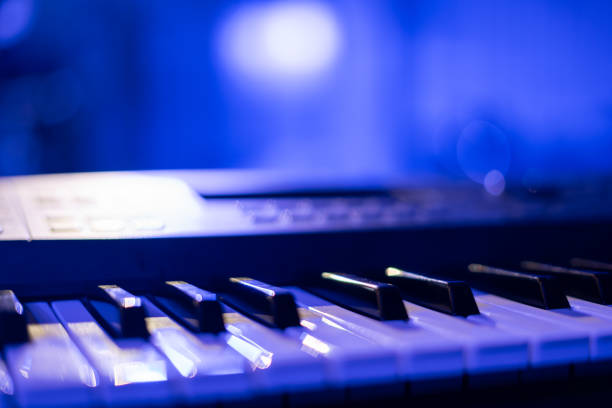 istock Piano musical keyboard on stage with blue lights. 2179259430