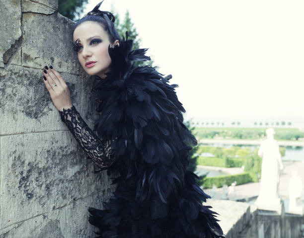 istock Fashion model posing next fountain in summer park 2179260472