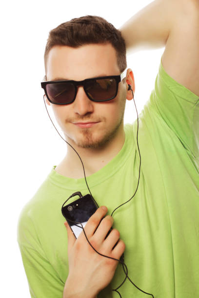 istock man listening music and using smartphone 2179265124