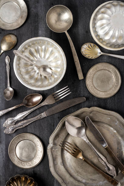 istock Vintage pewter plates, bowls and cutlery 2179274653